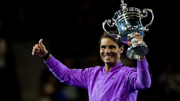 rafa_holds_up_2019_us_open_trophy.jpg